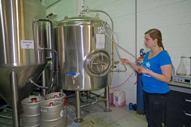 Brewery aids Kosa Vets Center Brewery owner Heide Hassing is shown giving a tour of the brewery. It takes three to six weeks before the beer is ready and some of it is aged in wooden bourbon casks.