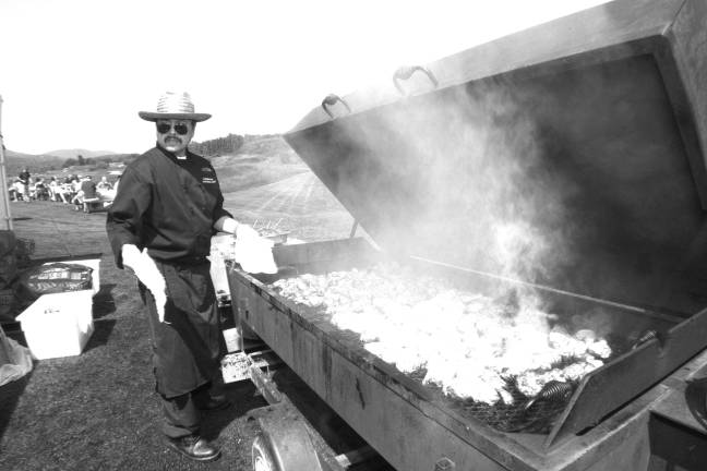 Crystal Springs Beer Fest brings together the best of two worlds Executive Banquet Chef Andy Macalion cooks up a few chicken legs.