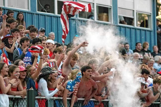 Football roundup: Vernon shuts out Dover <b>Sparta football fans celebrate after their team scores a touchdown.</b>