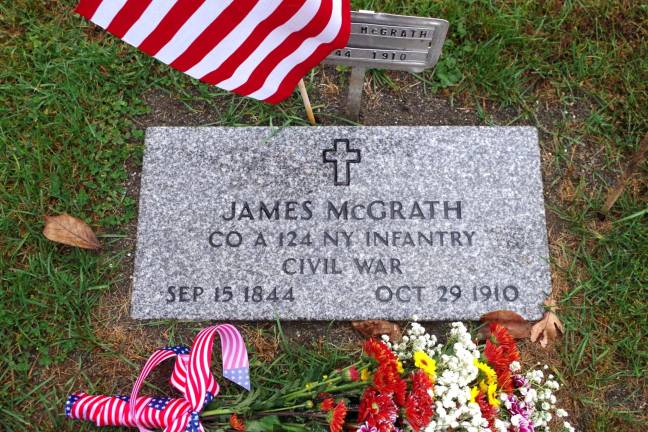PHOTOS BY CHRIS WYMAN The new headstone for Civil War veteran James McGrath was dedicated on Saturday morning at Hardyston&#xfe;&#xc4;&#xf4;s North Church Cemetery.
