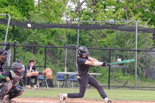 Photos: Rangers advance to semifinal In the second inning, Wallkill Valley's Dylan Miller hits the ball into foul territory. He made two runs.