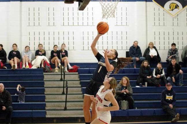 Jefferson's Cassidy Ball (1) takes the ball to the hoop during the game against Glen Rock on Friday, Jan. 5. She scored 20 points. (Photos by George Leroy Hunter)