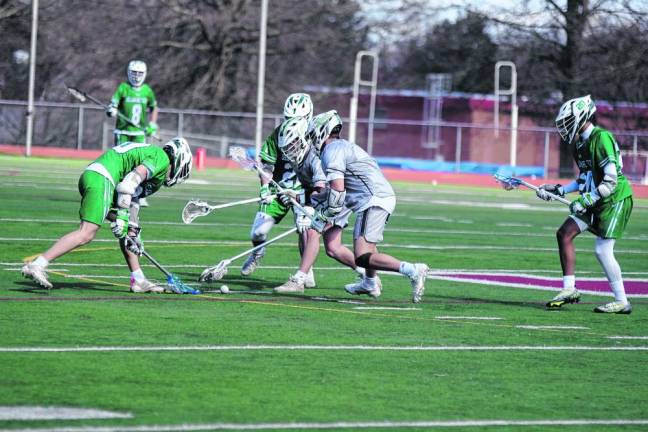 Players focus on the ball.