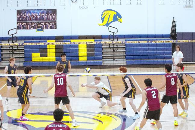 Sports roundup: Shatzel wins 3 gold medals Jefferson's Andrew Mohlenhoff performs a dig during a volleyball match against Clifton on May 15. He executed 14 digs, including the 1000th dig of his career. Jefferson won, 2-0. (Photos by George Leroy Hunter)