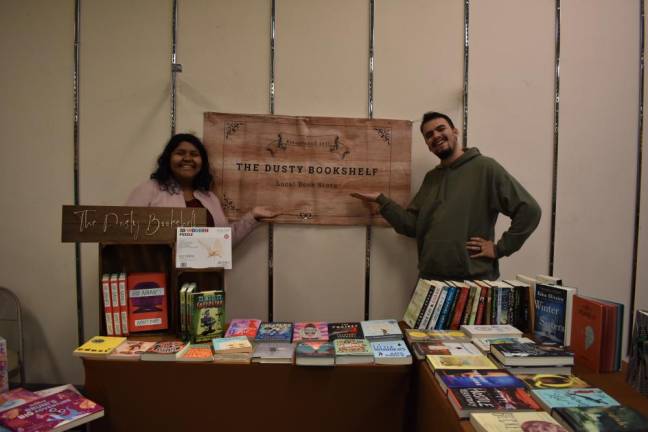 A new generation of indie bookstores – and readers – emerges post-pandemic Veronica and A.J. Siehin operating a pop-up bookshop at the Newburgh Mall Holiday Market on Saturday, Nov. 19.