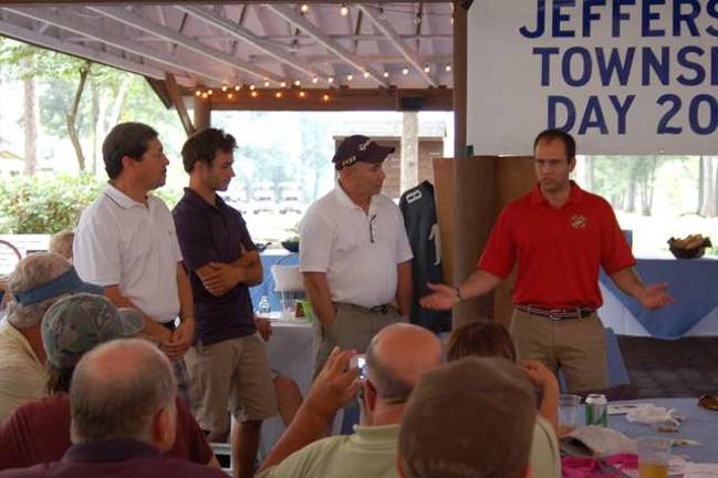 Wil Riggs, right, tells Max Alonso, Deven Alonso and Dave Alonso how he played marathon golf for 24 hours the Monday before the outing. He played 105 holes and walked approximately 34 miles stopping only for a thunder and lightning storm.