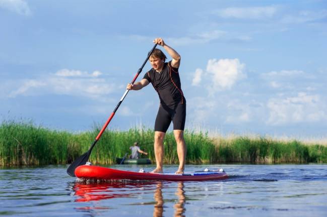 Is stand-up paddleboarding good exercise?