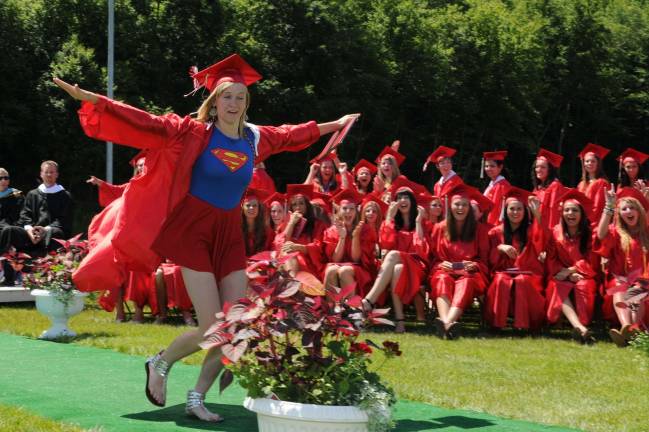 Hi-jinks at High Point graduation Kelsey Stoll is ready to fly.