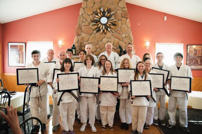 Vernon Valley Karate Academy announces black belt promotions (Back row L to R): Ed Lyden, Ryan Rieger, Sensei Chuck Ercolano, Sensei Tom Shull, Scott Wolven, Connor Shillcock, Tyler Douglass, and Christian Stone. (Middle row L to R): Braden Rosario, Scott Riley, Wade Riley Monica McGovern, Tyler Schoenfeld, and Alicia Warner. (Front row L to R): Samantha Wolujczyk, CJ Hintzen, Jillian Vazquez, and Rachel Olinski.