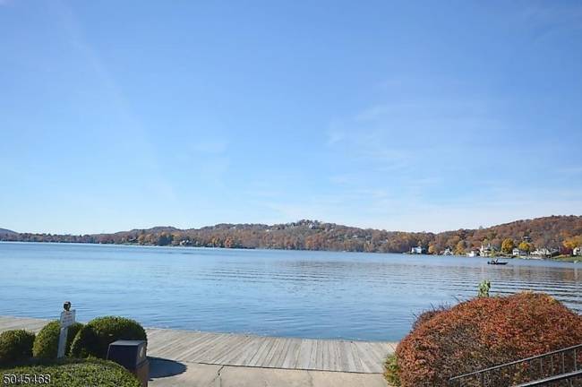 This Lake Mohawk four-bedroom home checks off all the boxes