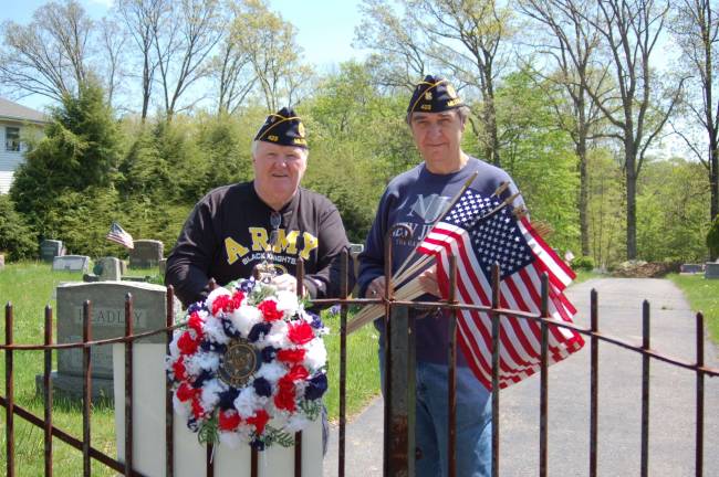 American Legion plans Memorial Day service Adjutant Michael Murphy and David Wilton prepare to decorate the graves at the Milton Cemetery in Oak Ridge for Memorial Day.