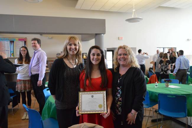 Sussex County Charter School of Technology counselor Mrs. Palumbo and nurse Mrs. Sokolewicz are shown with eighth-grader Danielle Nicole Weiss, the recipient of the 2014 caring award.