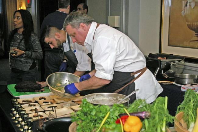 A scene from the Garden State Chef Throwdown. At the right is the winning chef, Crystal Springs Executive Chef John Greeley.
