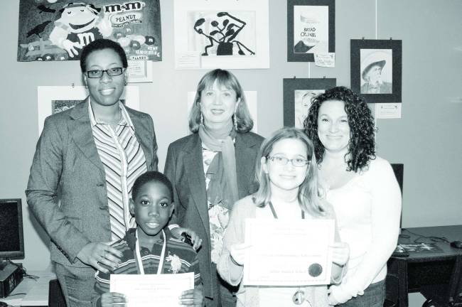 The Student Artist of the Month from the Ellen T. Briggs School and the Arthur Stanlick School are shown with their certificates and medals that were awarded to them at the recent presentations made by the Jefferson Arts Committee and the Jefferson Township Art Teachers. Shown are Mrs. Mensah and her son Kwadjo, Kathleen Weir, Art Teacher and Mrs. Maynard with her daughter Hannah.