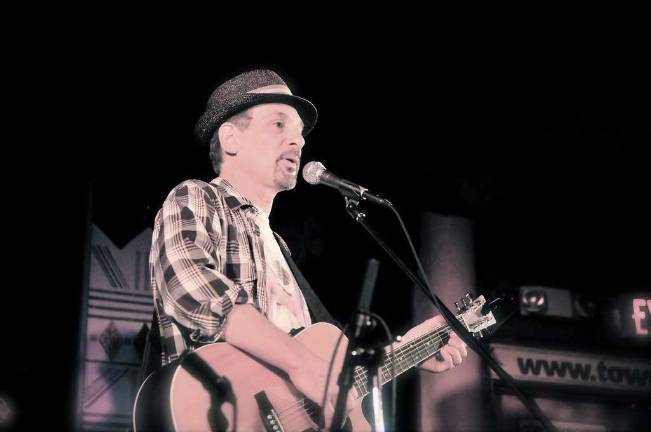 Don Lowe hosts the Monthly Singer Songwriter Showcase Dave Goldenburg.