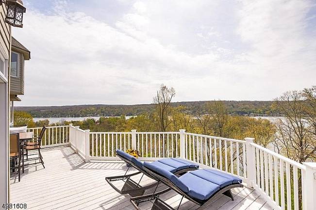 Stunning home offers panoramic views of Lake Mohawk Stunning home offers panoramic views of Lake Mohawk