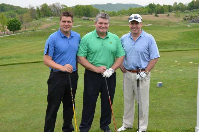 YMCA hosts annual golf outing Pictured from left to right are: Sean Oroho, state Sen. Steve Oroho (center) and Jim Oroho.