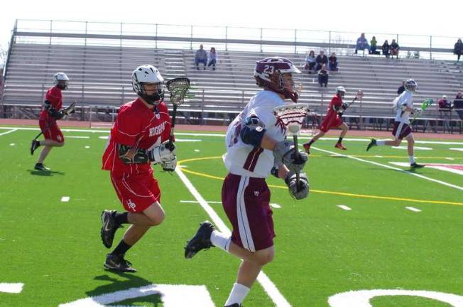 Newton's early surge drops High Point Newton's Ryan Qasem (23) with the ball.