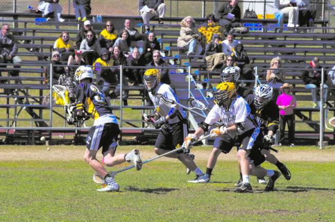 Photo by George Leroy Hunter The Vernon Vikings lost to the Jefferson Township Falcons in overtime in boys varsity lacrosse on Saturday, April 19, 2014.