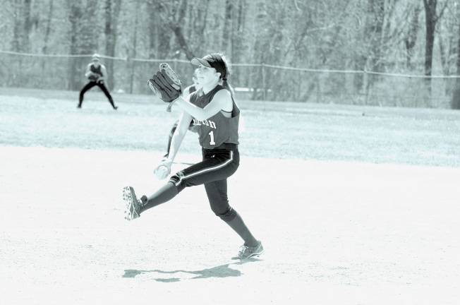 Newton's pitcher Sara Smith on the mound.