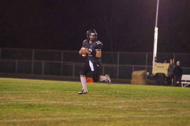 Wallkill Valley quarterback Rich Stecher drops back to pass.