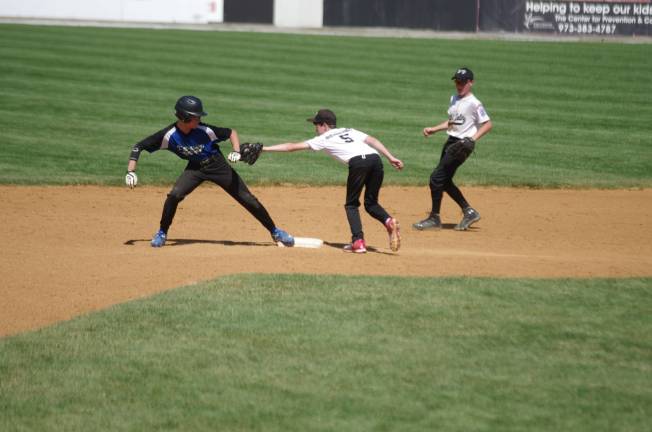 A Kittatinny runner makes it to second base before the Wallkill Valley tag.