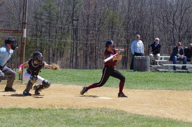 Newton's Angelica Morro checks her swing in a game against Sussex County Technical School Monday, April 21, 2014, in Sparta.