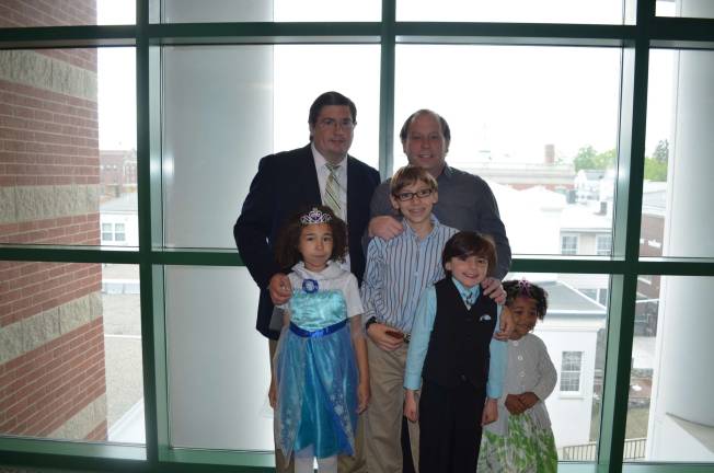 Ken (left), Raymond (right) with their children pictured from left Jada, Liam, Alex and Grace of Andover, N.J.
