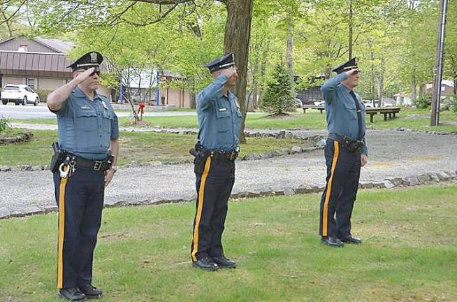 Byram honors those who made the ultimate sacrifice Former Mayor Richard Bowe concludes remarks as Boy Scouts from Troop 276 prepare to raise the colors. (Photo provided)