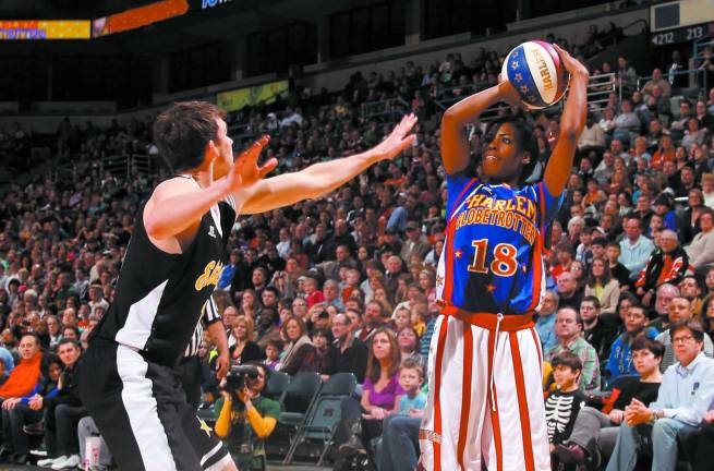 First female Harlem Globetrotter in 20 years makes team TNT Maddox
