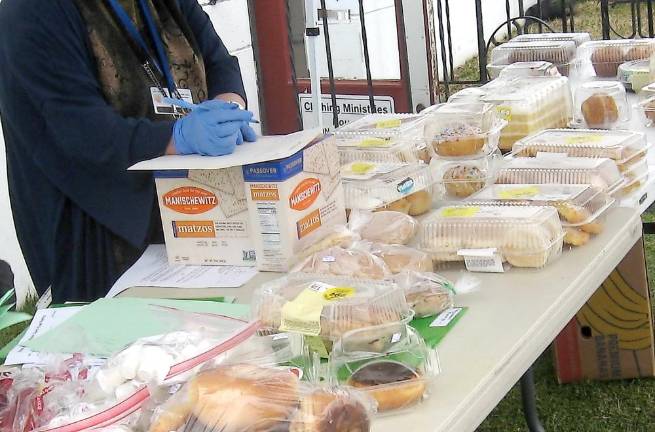 Food donations from Acme, ShopRite, and local residents are ready for pick-up.