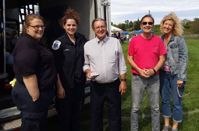 Hardyston happy with ambulance service PHOTO BY LAURA MARCHESEFrom right, Marianne Smith, Santo Verrilli, Mayor Carl Miller and workers from st. Clare' s Emt squad