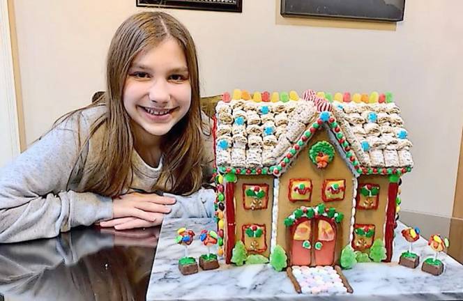Gingerbread houses delight the judges Ava Papageorge, third place kit, ages 9-12
