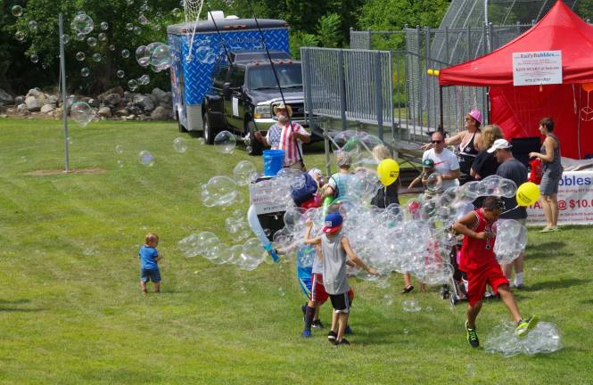 A popular attraction at Hamburg Day was Edward Miller of Hamburg who released hundreds of bubbles simultaneously with his &quot;EaZyBubbles&quot; bubble wands.