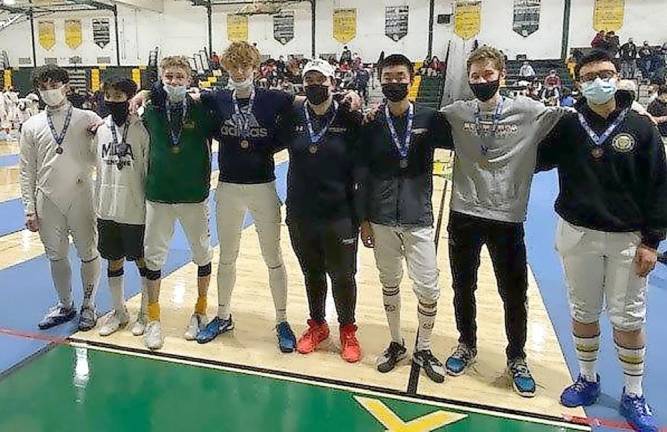 Pope John fencer from Hamburg finishes fourth in state championships The top eight to advance to the final round of Men’s Saber: third from left, Neil Lilov (Morris Knolls High School, champion); fourth from left, Allen Trudnos (Pope John, fourth place); fifth from left, Konrad Czyrzewski (Newark Academy High School, third place); sixth from left, Deng Andrew (Newark Academy High School, second place) (Photo provided)
