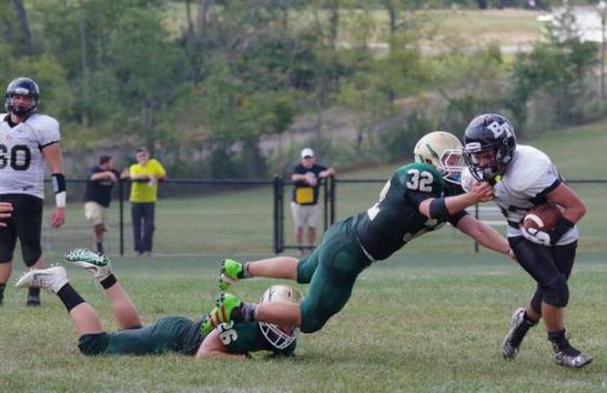 Sussex Tech romps over Bergen Sussex Tech linebacker Kevin Utter grabs the jersey of Bergen Tech running back Tyler Pavese.