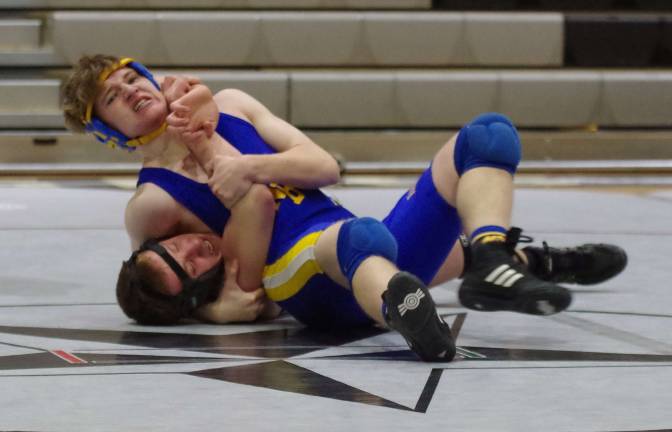 North Brunswick's Cody Lebosky on top of Wallkill Valley's Steven Line in the 182 lb category.