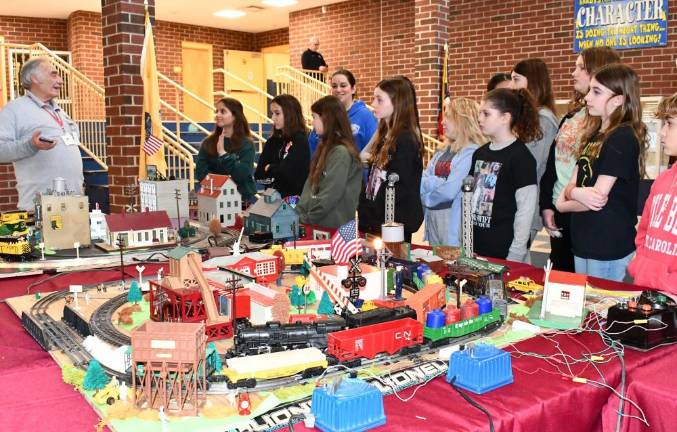 RR2 Robert Winter, left, a member of the Sussex County Railroad Club, talks to sixth-graders at Hardyston Middle School about model trains Wednesday, Jan. 24. Club members took the trains to Hardyston Elementary School a week earlier. (Photos by Maria Kovic)