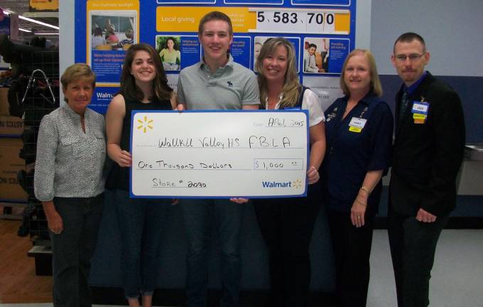 Wallkill Valley FBLA received a $1,000 Walmart grant from the Walmart Foundation Community Grants Team and the Franklin Walmart. Pictured, from left, are: FBLA Adviser Carol Jurkouich; FBLA President Carly DeOliveira; FBLA Membership Vice President Scott Mueller; Walmart Partner Tracey Mueller; Store Manager Marie Pallotta; and Assistant Manager Josh Cooper.