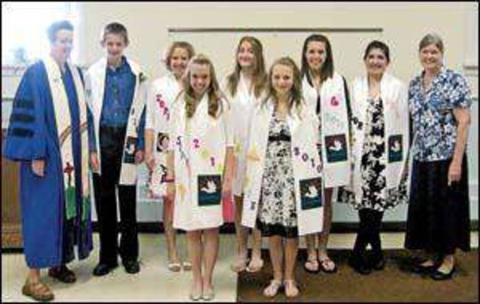 Christian academy holds first high school graduation Christian academy holds first high school graduation