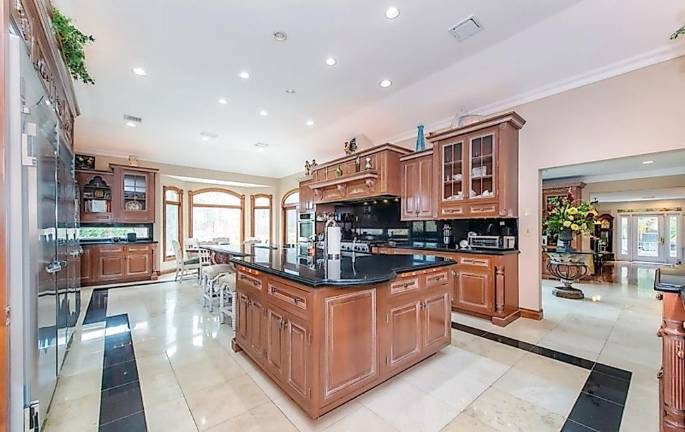 Custom estate includes car charging station, hot yoga room, and frescos Custom estate includes car charging station, hot yoga room, and frescos