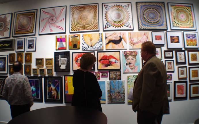 New Hamburg gallery focuses on local artists Visitors are shown during the Art Etc GalleryþÄôs holiday gathering. In the background are a series of paintings created by Sparta artist Patty Margalotti meant to raise awareness of breast cancer. Margalotti is striving to establish herself in the art world. Her influences include the great Edward Degas and Claude Monet.