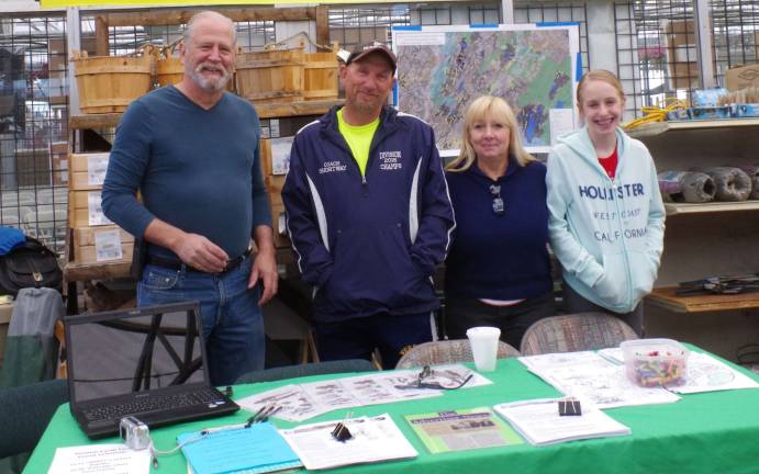 The Vernon Township GAAC (Greenway Action Advisory Committee) made its EarthFest debut on Sunday. Headed by Mike Furrey, shown from the left are former Vernon Environmental Commission member Craig Williams, Vernon Mayor Harry Shortway, former mayor Sally Rinker, and Shannon Geiger-Rinker.