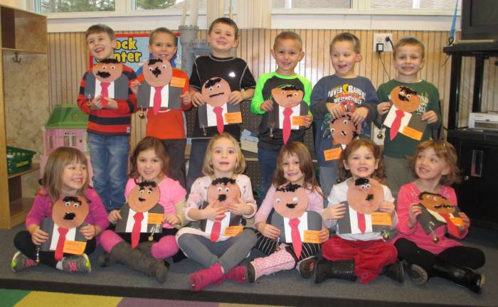 Auxilium School Class 4D is shown with portraits of Dr. Martin Luther King, Jr.