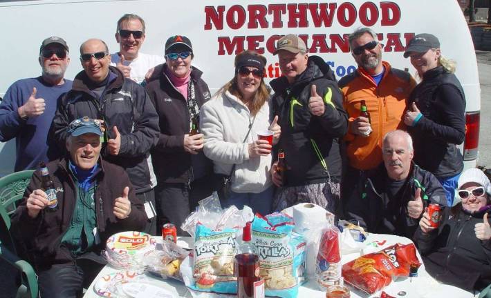 Local skiers and riders hold a premature end of season tailgate party on Sunday March 29.