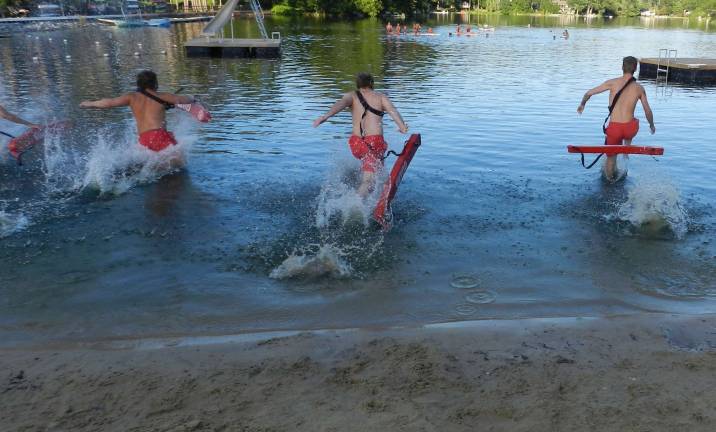 Lake Mohawk lifeguards win competition Taking off in the Rescue Tube Relay