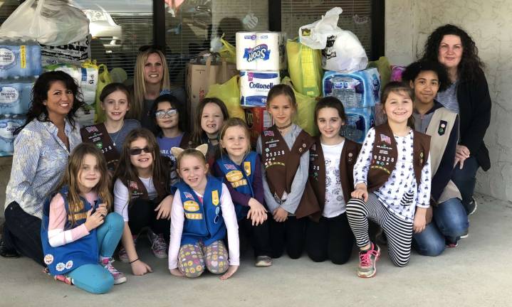 Girl Scouts drop off donation to preschool