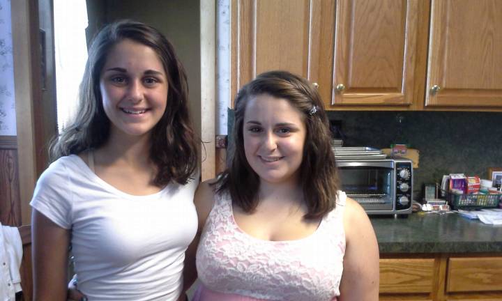 Sisters make hair donation Brittany and Danielle Weiss are shown after making their hair donations.