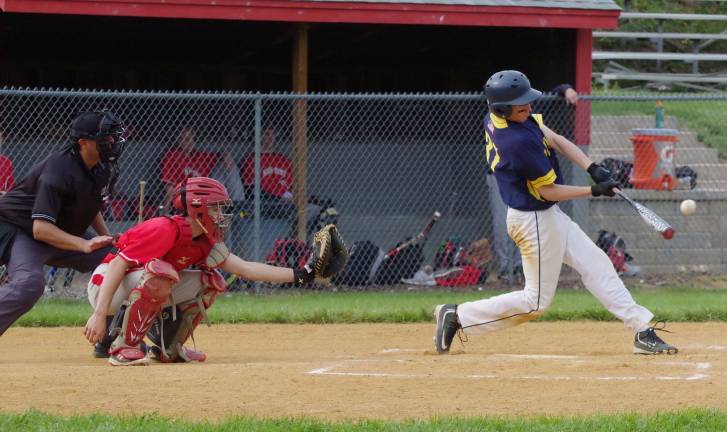Vernon batter Jadon Mutz connects with the ball in the fifth inning.