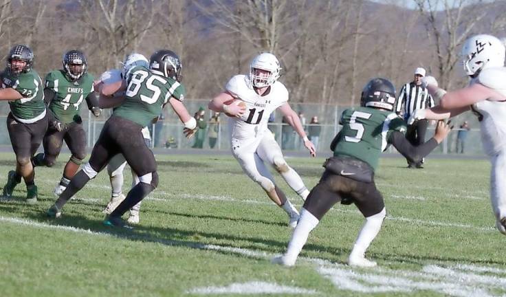 Wallkill Valley quarterback Tommy Testino carries the ball in the second half.